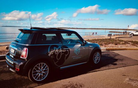 Custom designed signage on mini cooper