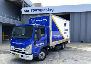 Storage King truck with custom fleet signage, featuring bright branding for mobile advertising and visibility