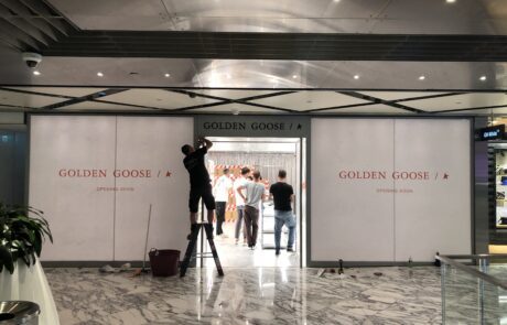 Golden Goose store under construction with branded exterior signage.