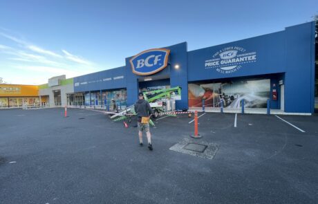BCF storefront signage with Price Guarantee branding.